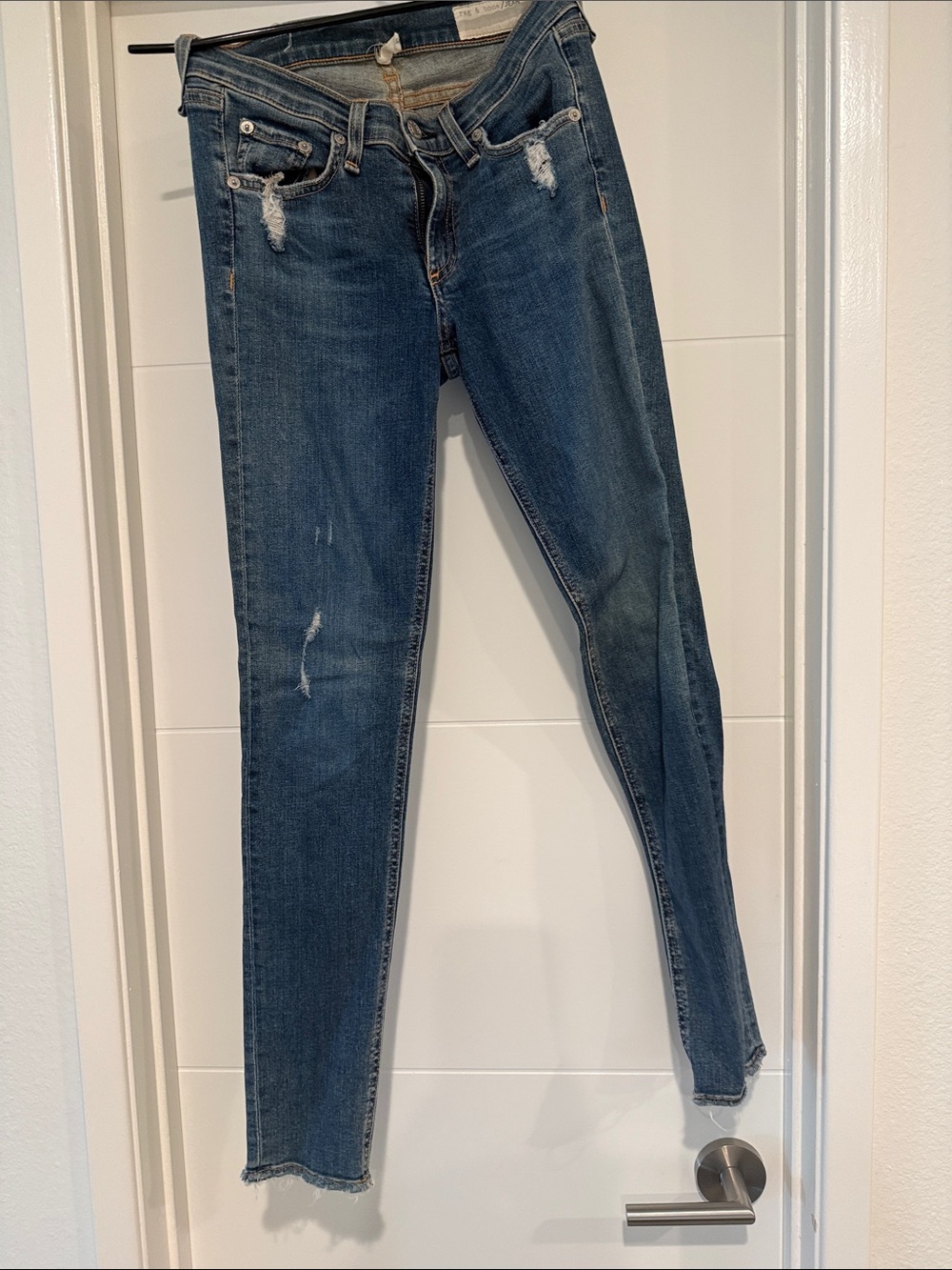 rag & bone medium blue skinny jeans with light distressing